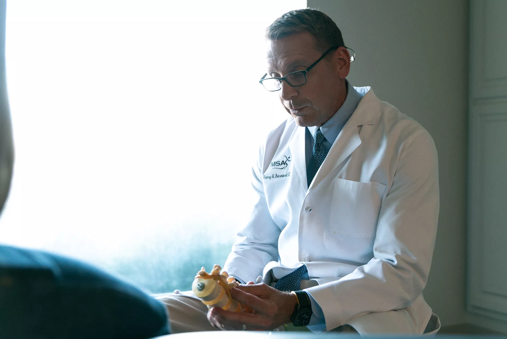 Dr. Barnard speaking with a patient